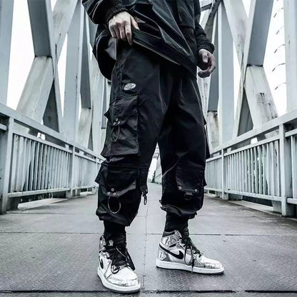 Black oversized cargo pants with multiple pockets, durable streetwear