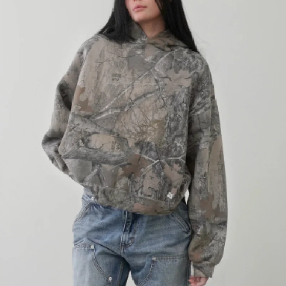 Camouflage hoodie hood up worn, streetwear statement piece KLOSET